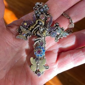 Kirk’s Folly necklace, cross with nymph, bejeweled butterflies, flowers.